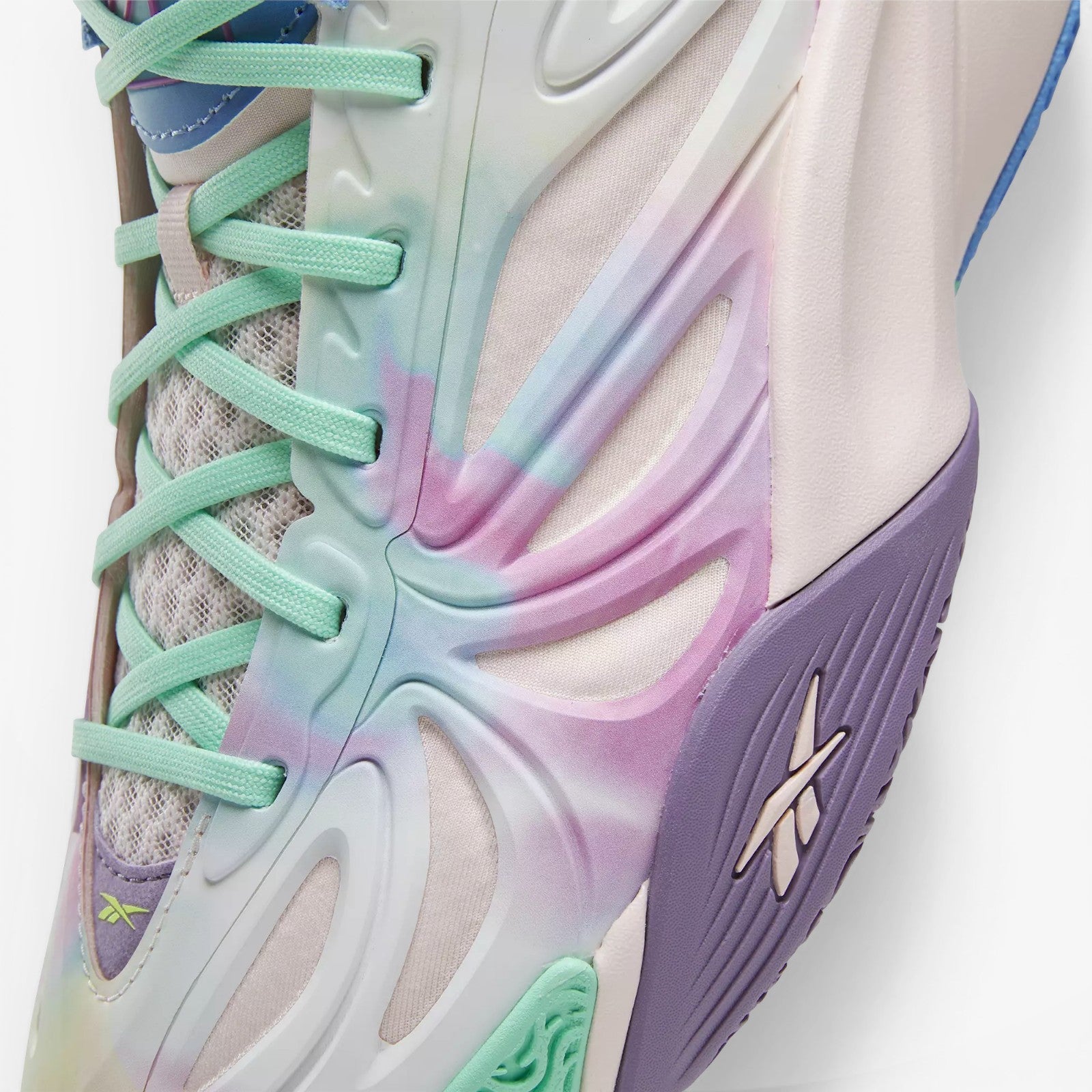METRO Reebok Angel Reese 1 basketball sneakers in Atomic Aqua, Dream Purple, and Peri Blue tie-dye mesh with mint green laces and purple outsole.