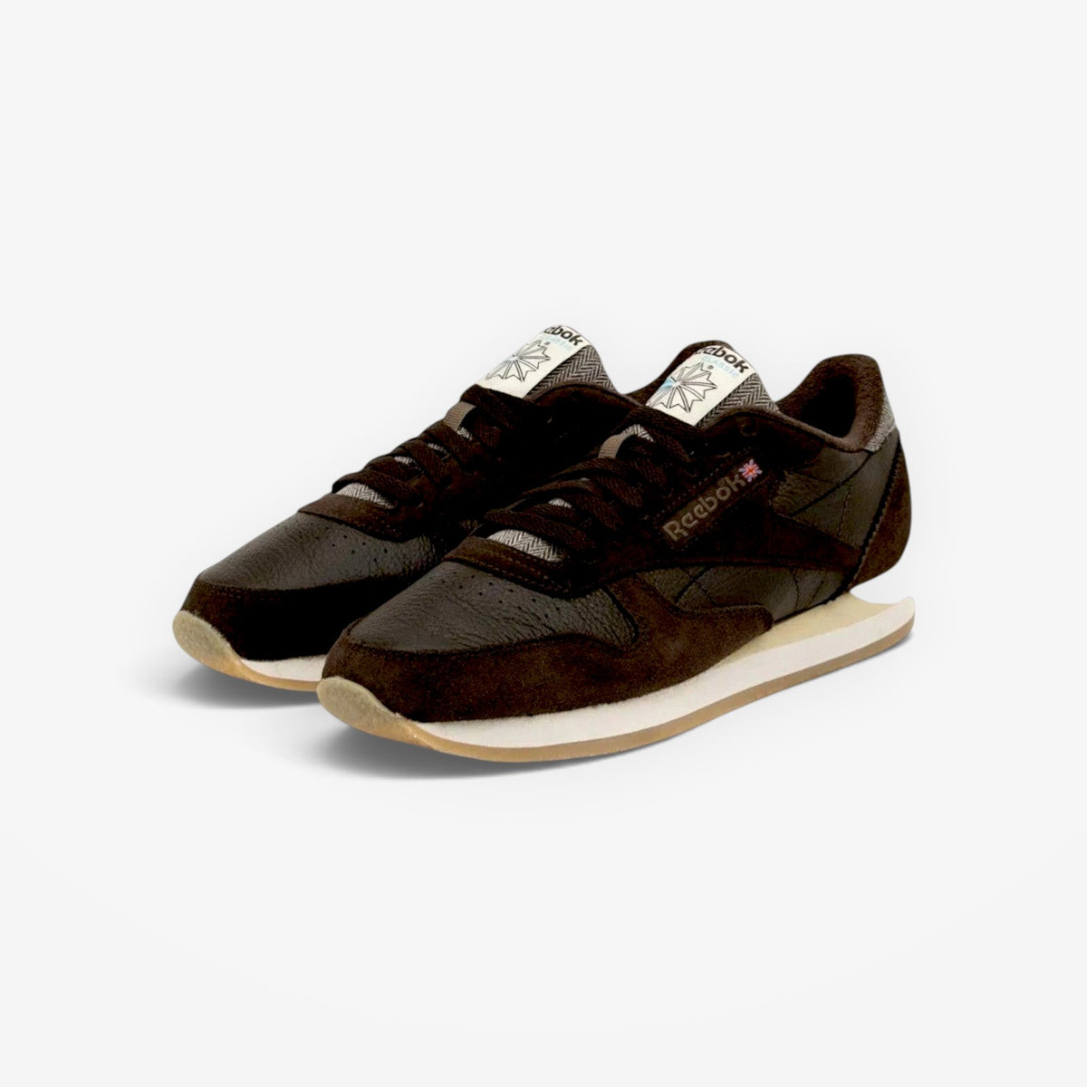 METRO Reebok Classic Leather 1983 Vintage sneakers in dark brown premium leather with a retro rubber outsole.