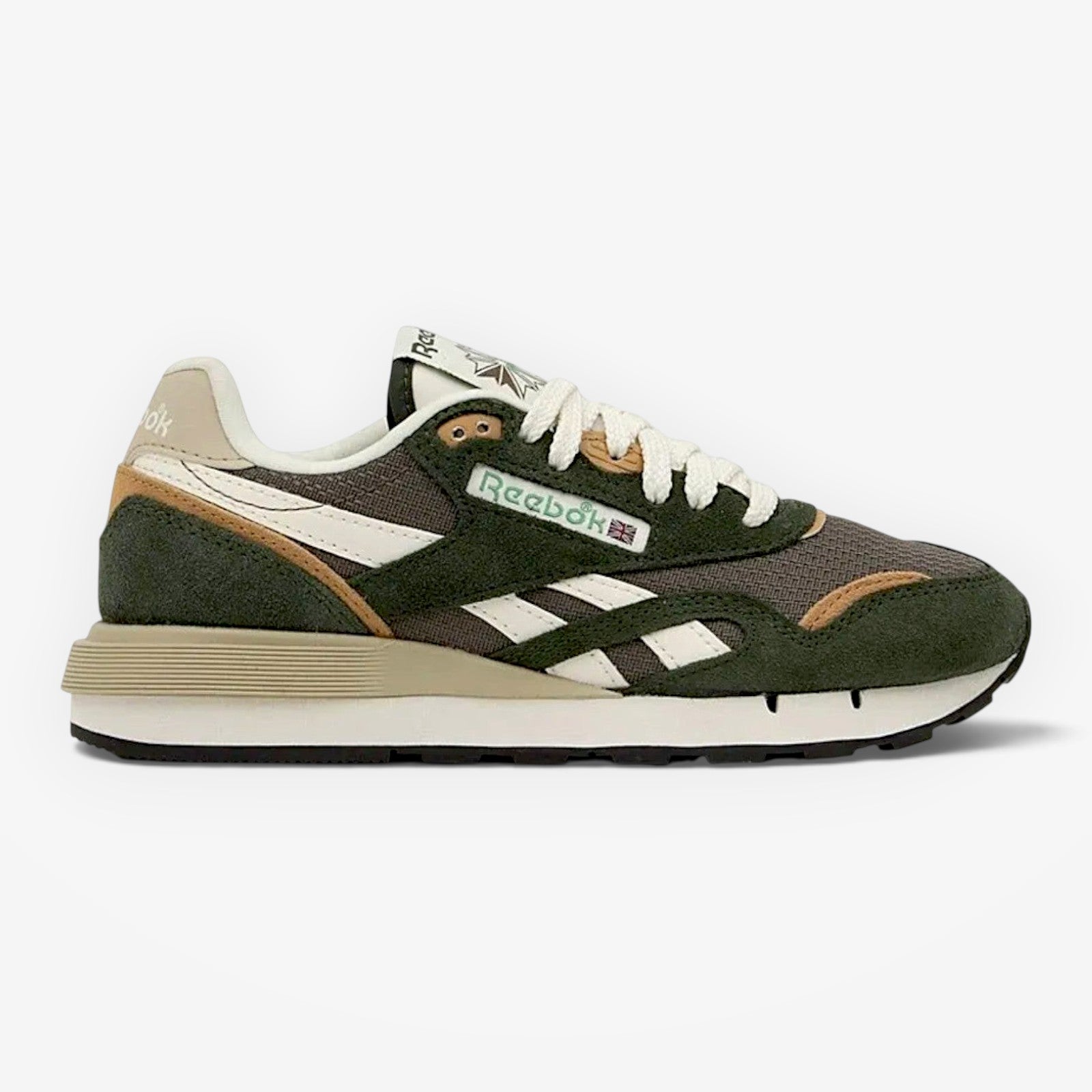 METRO Reebok Classic Nylon 89 sneaker in Grit Green with suede and nylon upper, white side stripes, and EVA midsole.