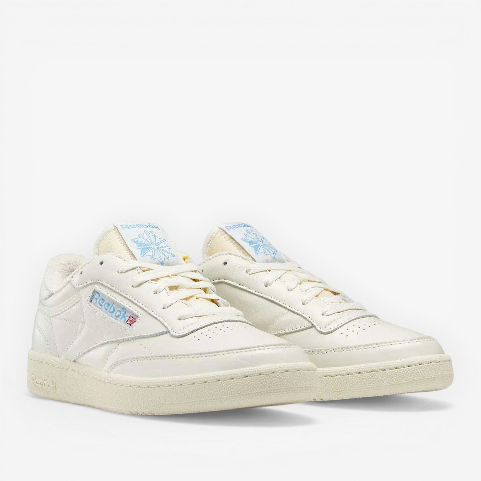 METRO Reebok Club C 85 Vintage chalk blue leather low-top sneakers with EVA cushioning and rubber outsole.
