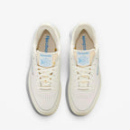 METRO Reebok Club C 85 Vintage low-top sneakers in chalk and essential blue leather with lace-up closure and rubber sole.