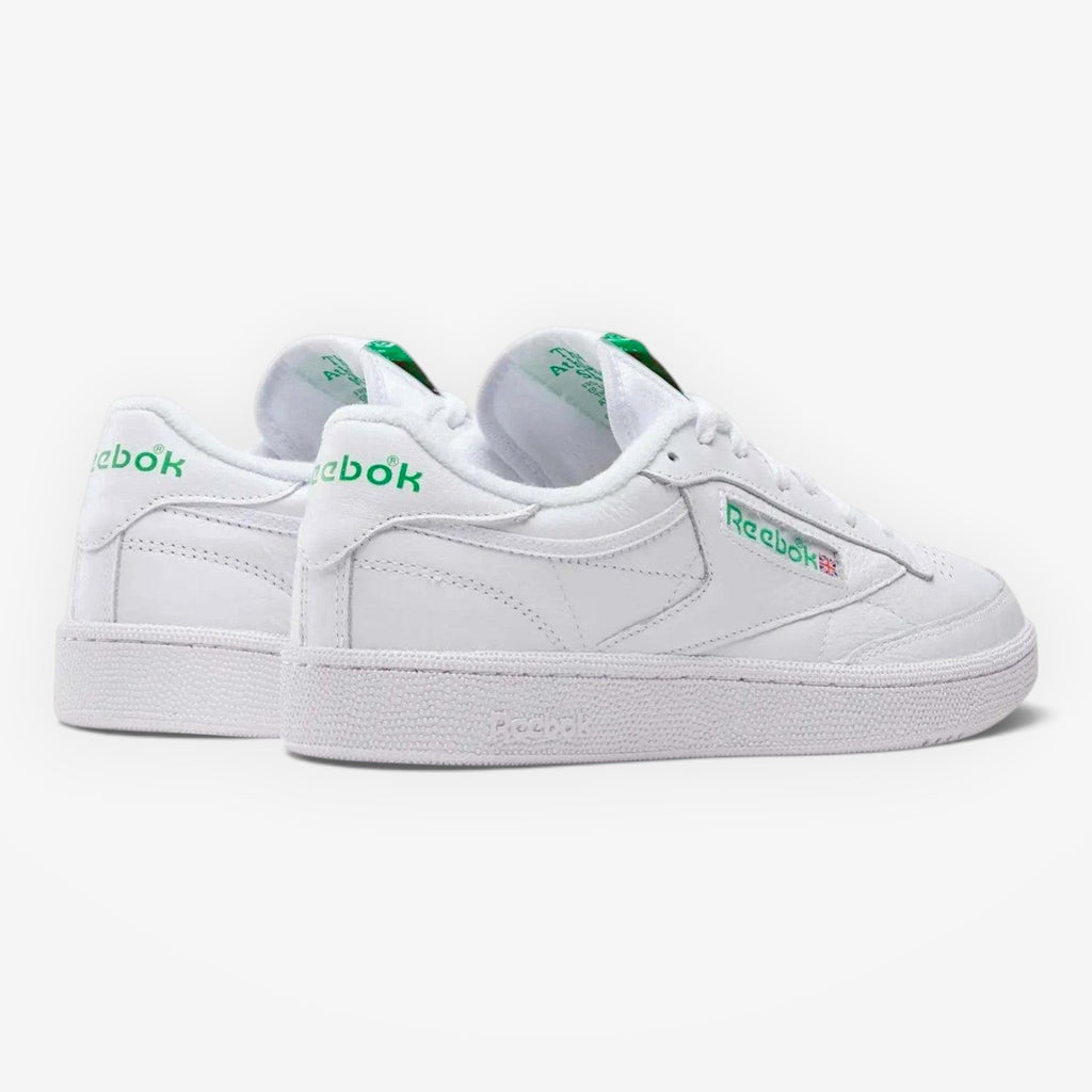 METRO Reebok Club C 85 white green leather low-top sneakers with lace-up closure and round toe.