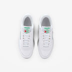 METRO Reebok Club C 85 white green leather low-top sneakers with lace-up closure and classic tennis shoe style.