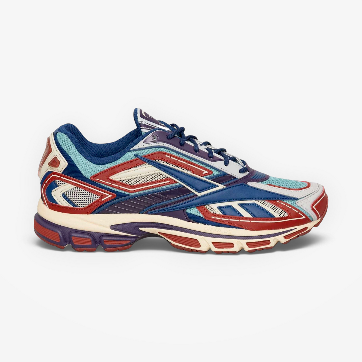 Metro Reebok Premier Road Ultra sneakers in red, hazy teal, and white with a layered mesh and synthetic upper.