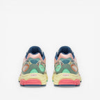 METRO Saucony ProGrid Omni 9 beige blue floral print sneakers with pink, yellow, and mint green accents.