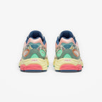 METRO Saucony ProGrid Omni 9 beige blue floral print sneakers with pink, yellow, and mint green accents.