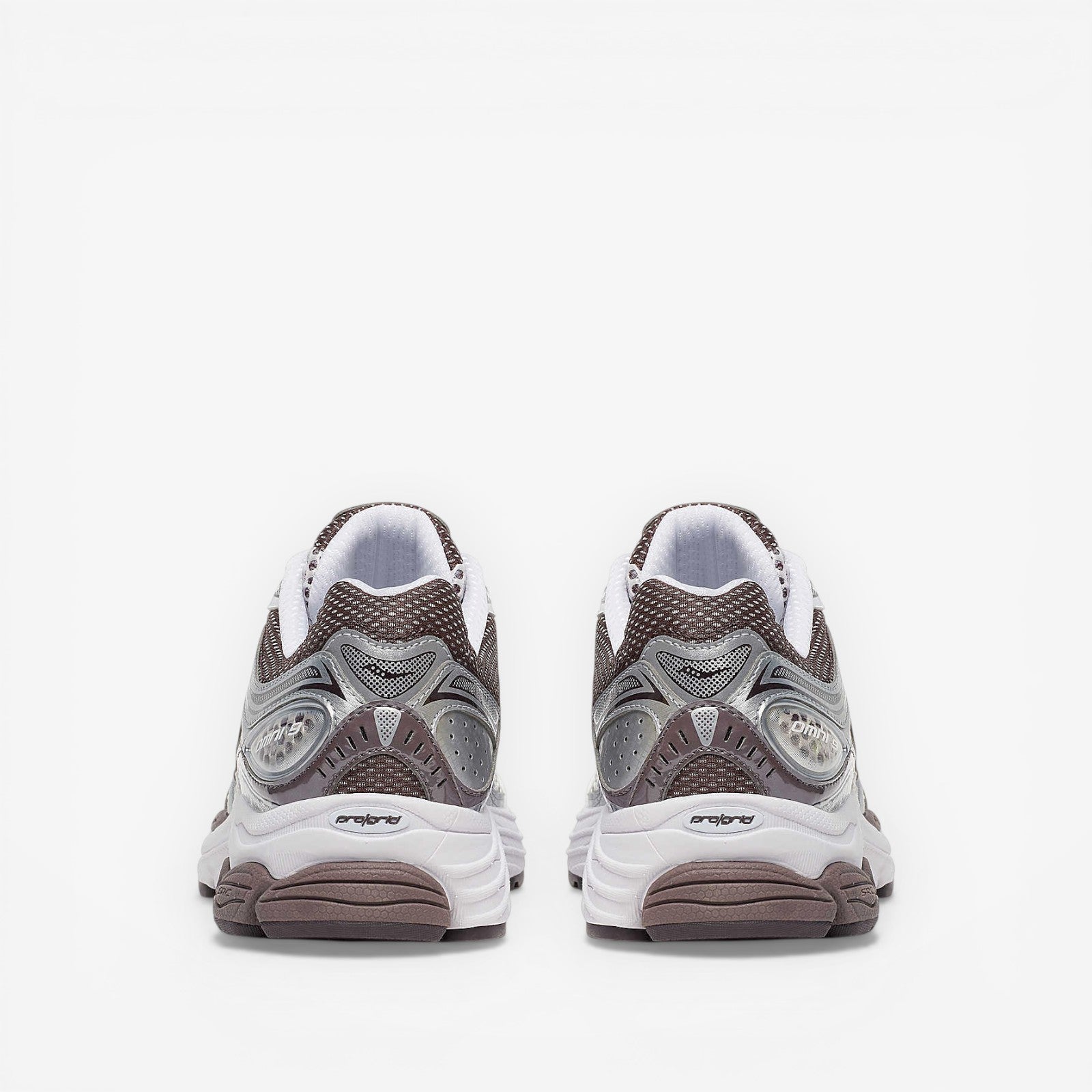 METRO ProGrid Omni 9 retro runner sneakers in white, brown, and silver mesh with synthetic overlays and ProGrid cushioning.