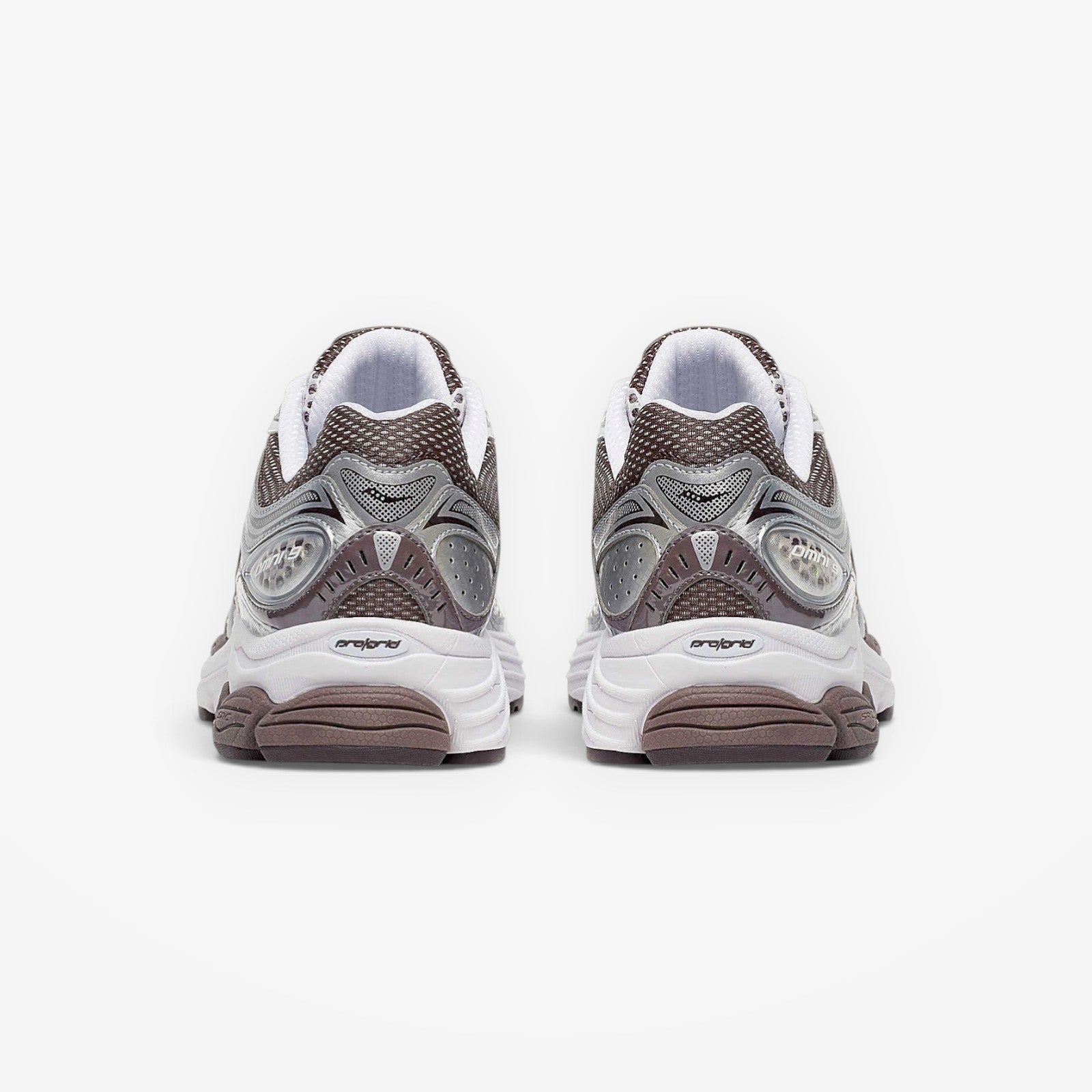 METRO ProGrid Omni 9 retro runner sneakers in white, brown, and silver mesh with synthetic overlays and ProGrid cushioning.