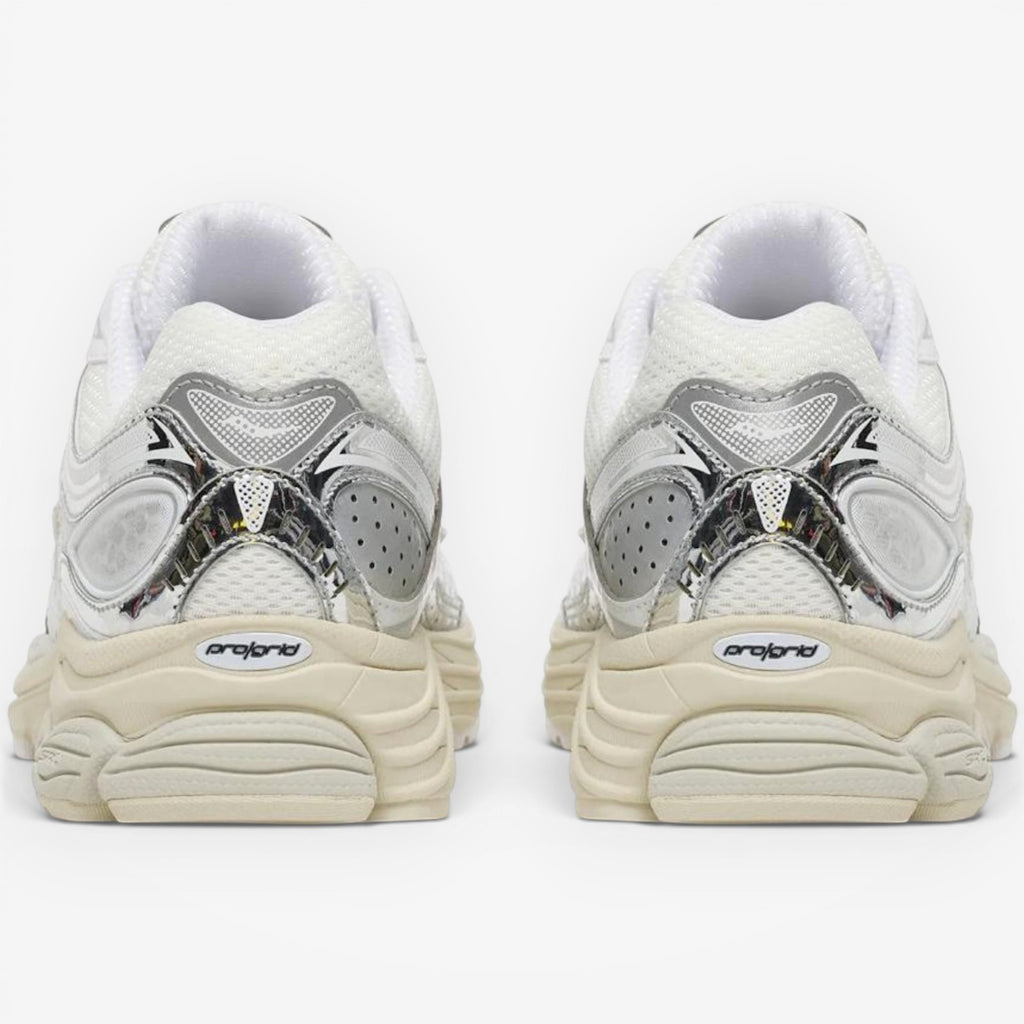 METRO Saucony ProGrid Omni 9 OG sneakers in white and eggshell with breathable mesh and metallic synthetic overlays.