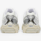METRO Saucony ProGrid Omni 9 OG sneakers in white and eggshell with breathable mesh and metallic synthetic overlays.
