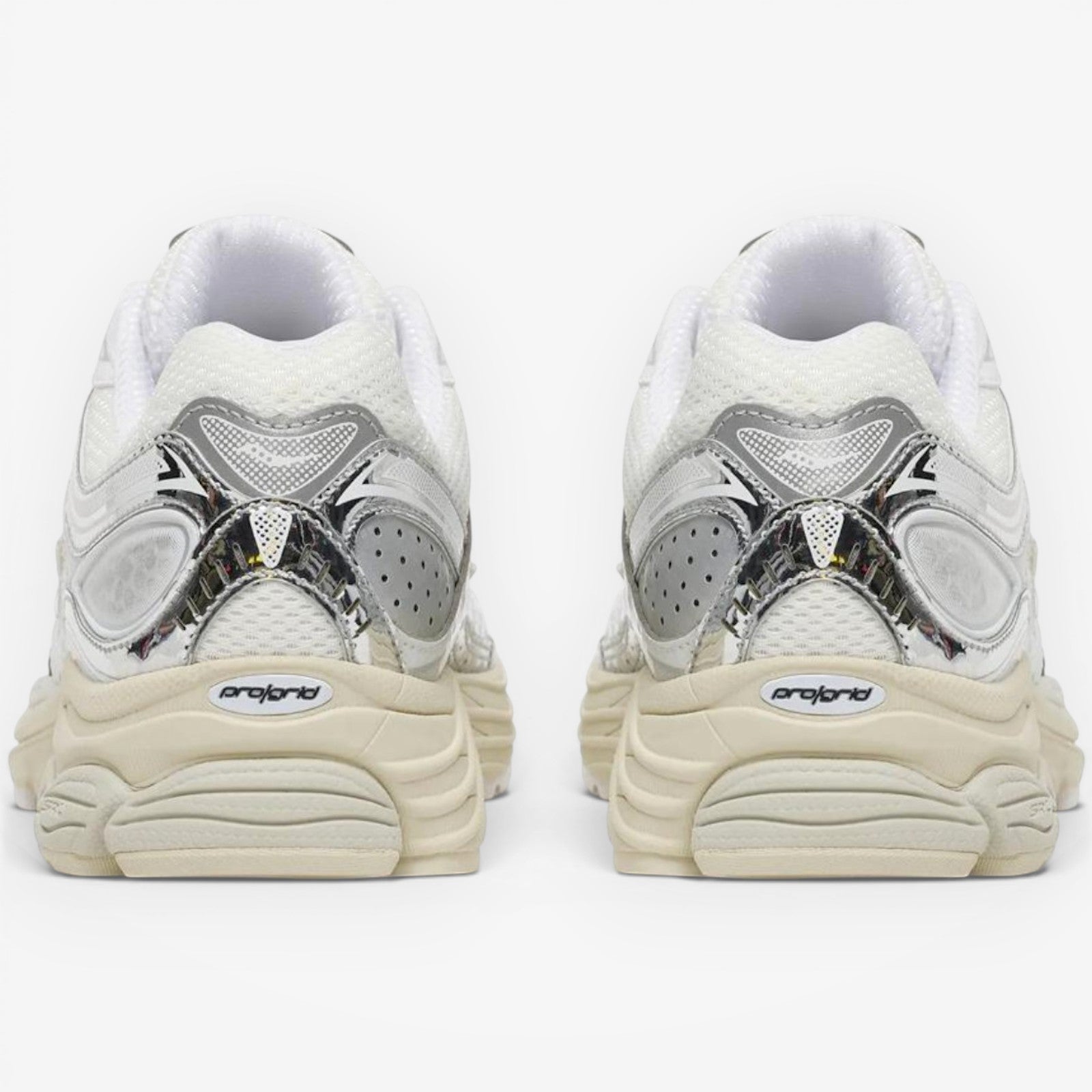 METRO Saucony ProGrid Omni 9 OG sneakers in white and eggshell with breathable mesh and metallic synthetic overlays.