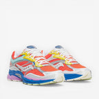 METRO ProGrid Omni 9 orange and multi-color mesh and synthetic overlay running shoes with white laces and blue soles.