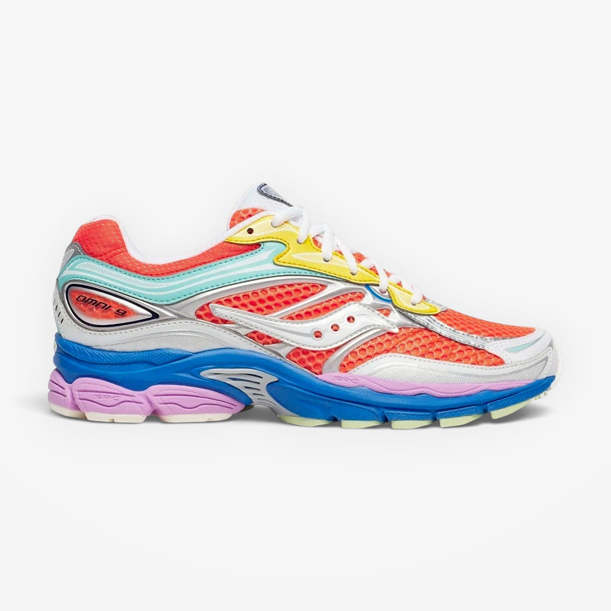METRO Saucony Progrid Omni 9 retro runner in vibrant orange, silver, blue, and yellow mesh with synthetic overlays