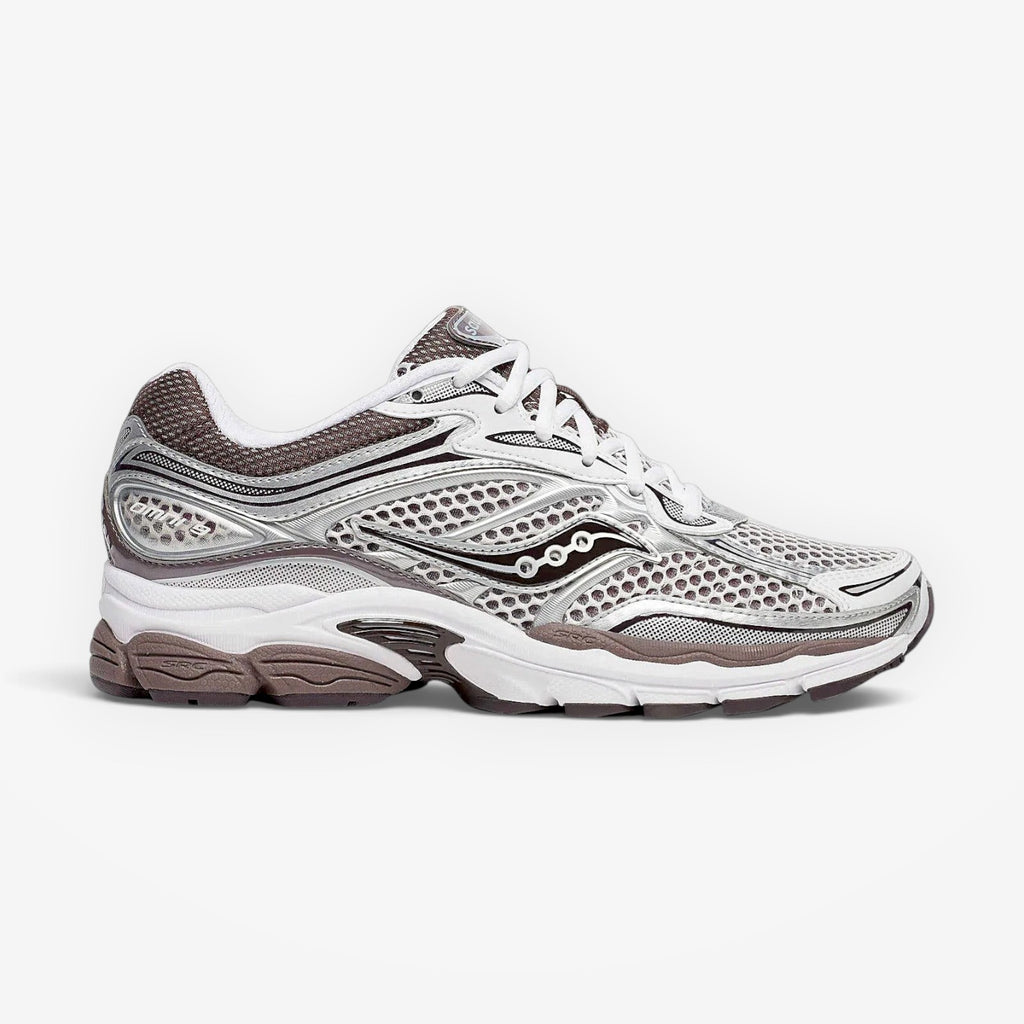 METRO ProGrid Omni 9 white and brown mesh sneakers with silver accents and ProGrid cushioning.