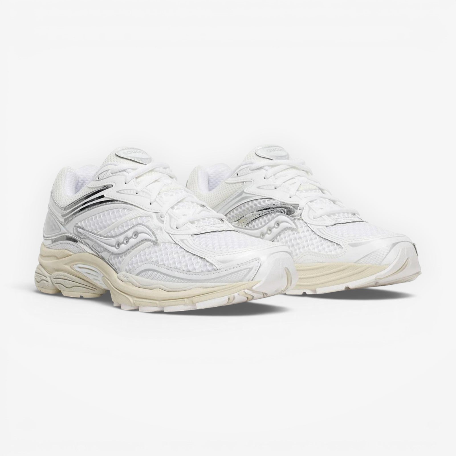 METRO Saucony ProGrid Omni 9 OG sneaker in white and eggshell with breathable mesh and metallic synthetic overlays.