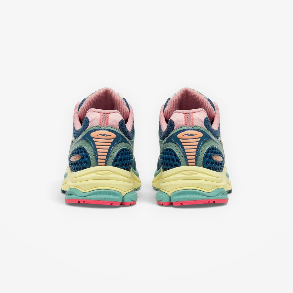 METRO Saucony ProGrid Triumph 4 beige and blue mesh sneakers with pink accents and layered design.