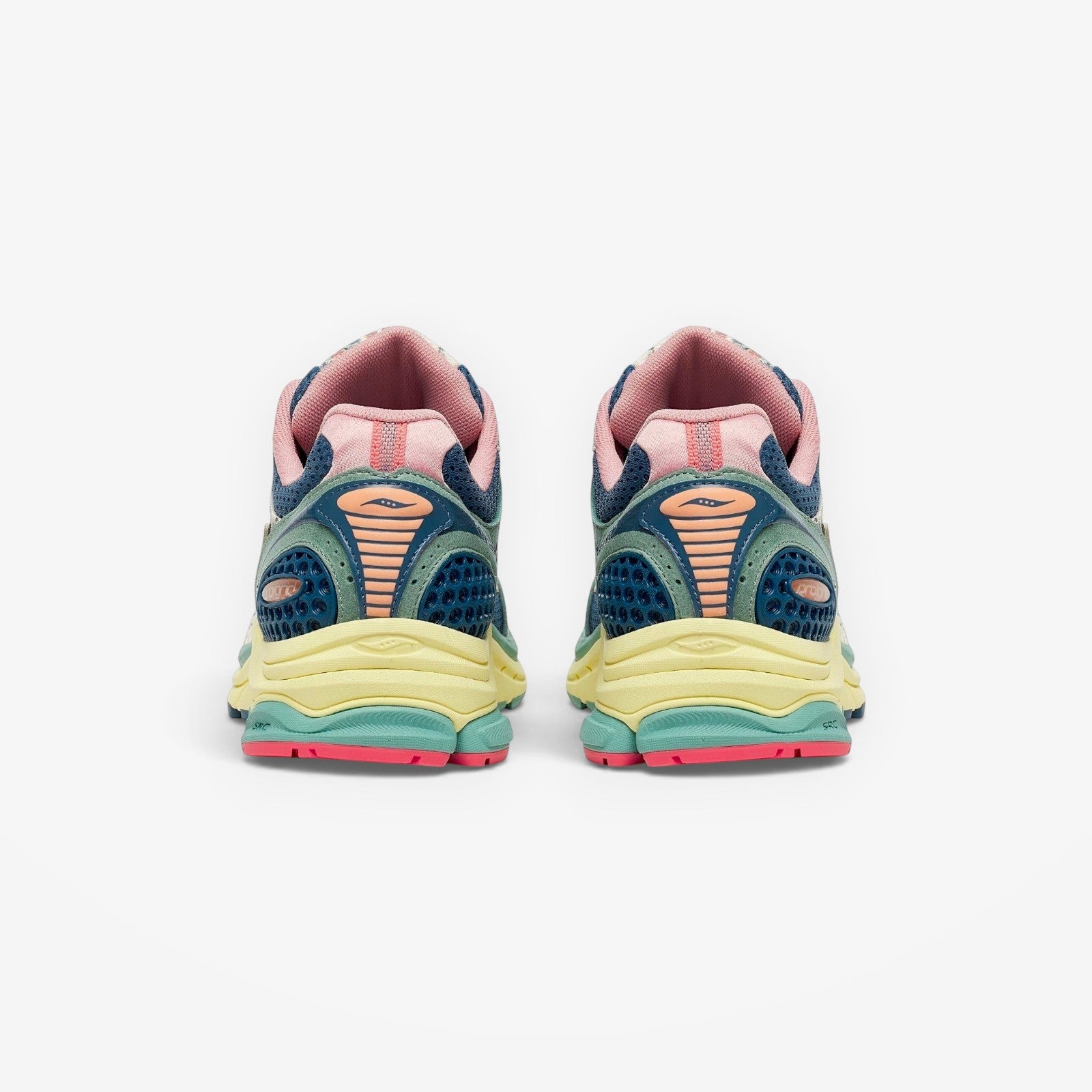 METRO Saucony ProGrid Triumph 4 beige and blue mesh sneakers with pink accents and layered design.