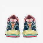 METRO Saucony ProGrid Triumph 4 beige and blue mesh sneakers with pink accents and layered design.