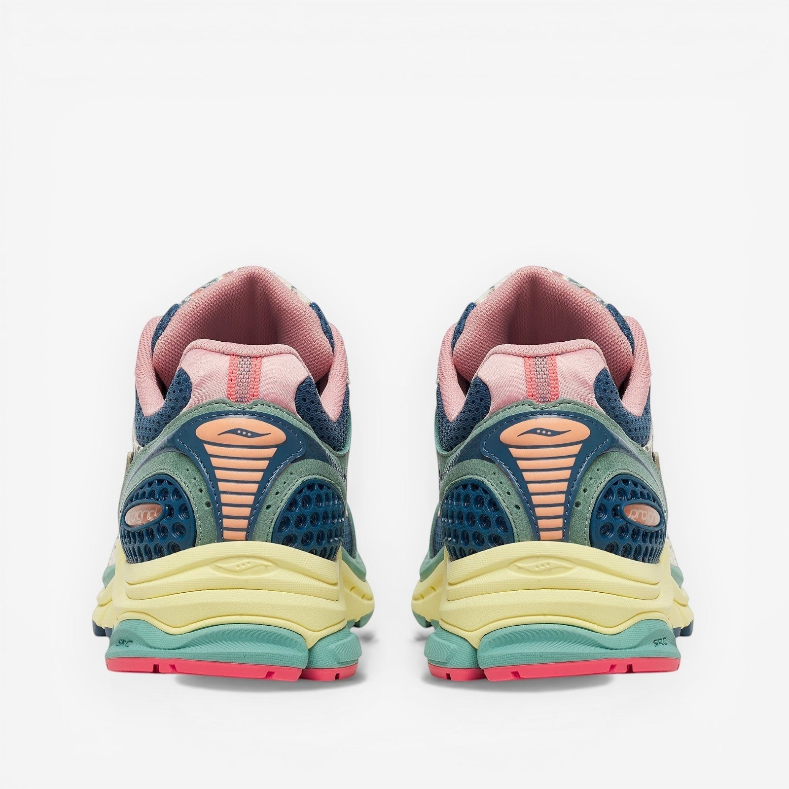 METRO Saucony ProGrid Triumph 4 beige and blue mesh sneakers with pink accents and layered design.