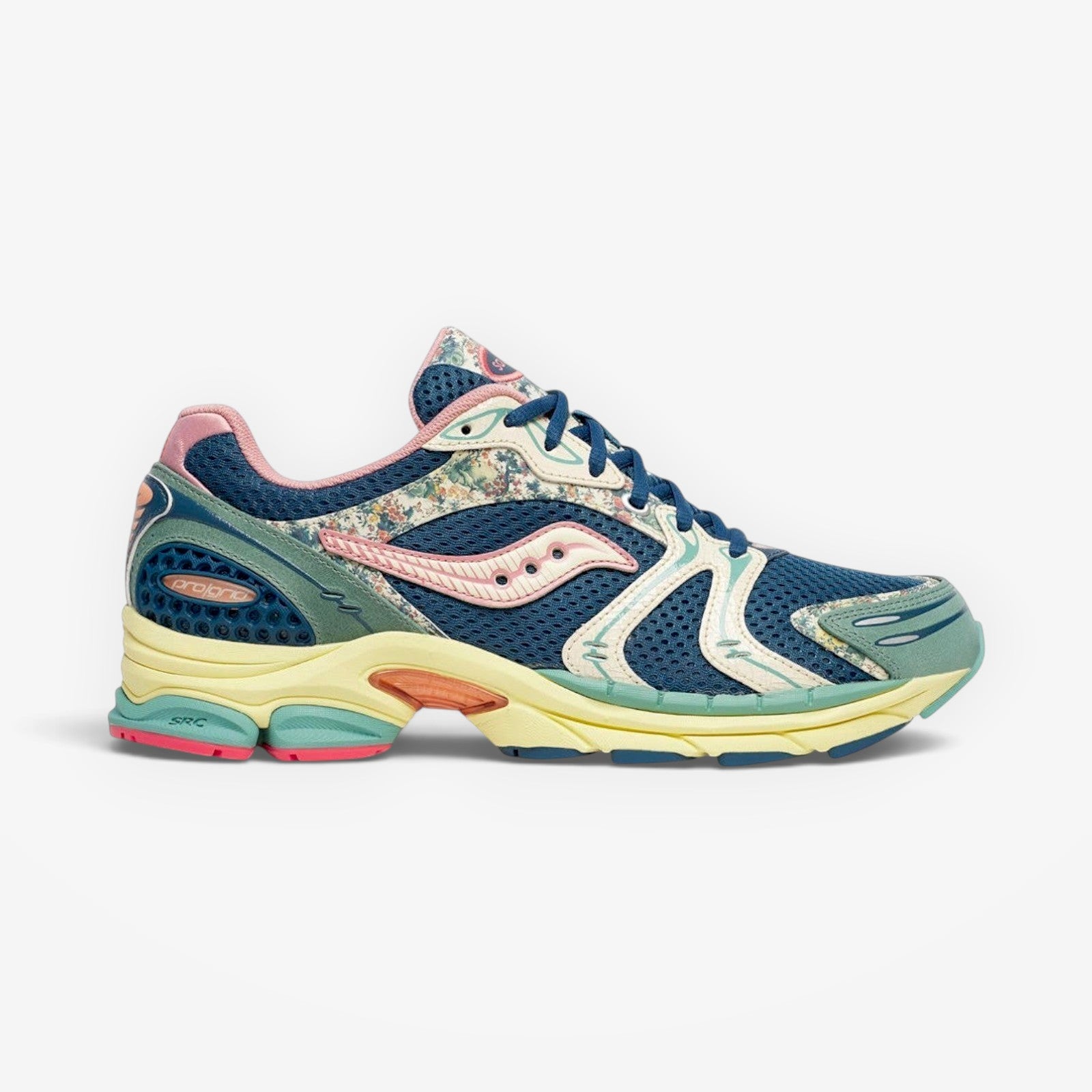 METRO Saucony ProGrid Triumph 4 blue beige floral mesh running sneakers with ProGrid cushioning.