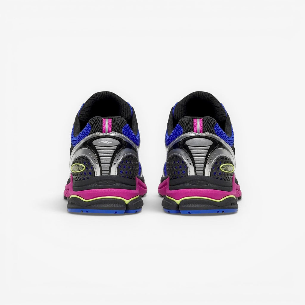 METRO Saucony ProGrid Triumph 4 sneakers in Dazzle and Silver, showing the rear view of the Y2K style running shoes.