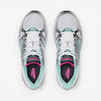 METRO: Saucony Ride Millennium women's sneakers in silver, white, and aqua. Mesh and synthetic overlays with cushioned sole.