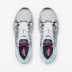 METRO: Saucony Ride Millennium women's sneakers in silver, white, and aqua. Mesh and synthetic overlays with cushioned sole.