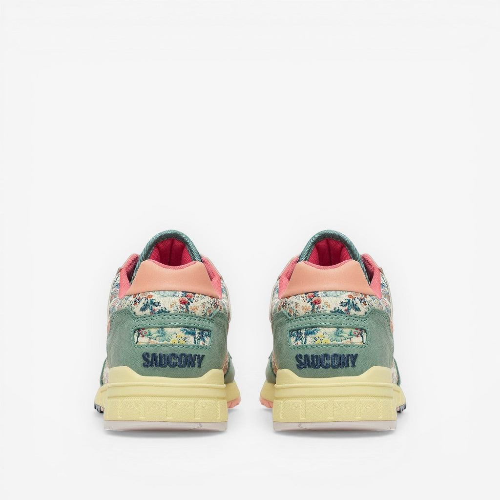 METRO Saucony Shadow 5000 floral print sneakers with green suede and light yellow sole.