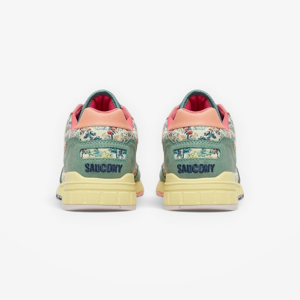 METRO Saucony Shadow 5000 floral print sneakers with green suede and light yellow sole.