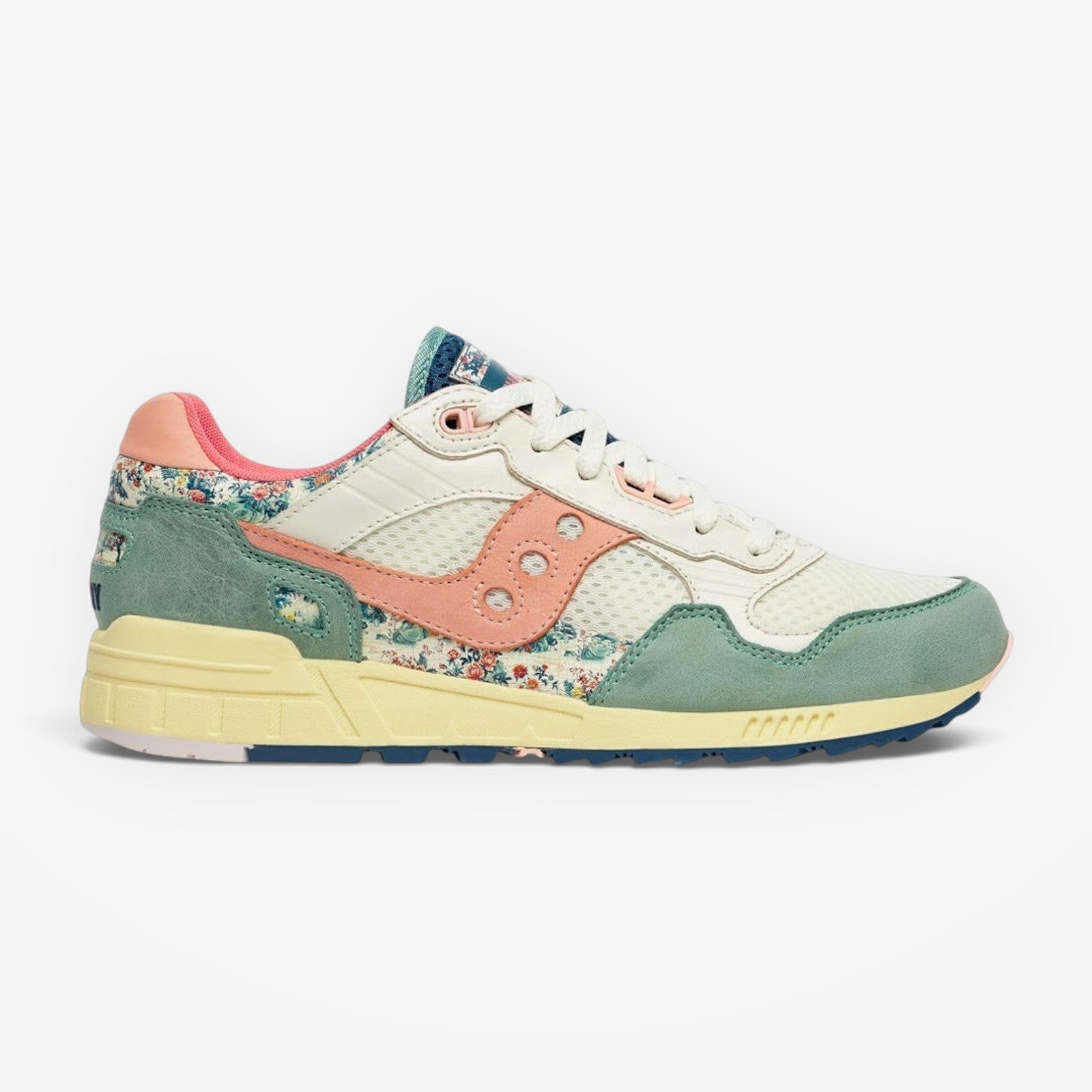METRO Saucony Shadow 5000 floral print sneakers with beige, blue, pink, and green accents. Suede and mesh.