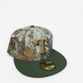 METRO Texas Rangers 40th Anniversary fitted hat in camo with gold 'T' logo and green brim. Features a 40th Anniversary side patch.