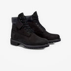 METRO Timberland Premium 6-inch waterproof boots in black nubuck leather with a padded collar and lug sole.