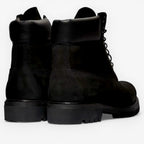 METRO Timberland 6-Inch black waterproof leather boots with padded collar and lug sole.