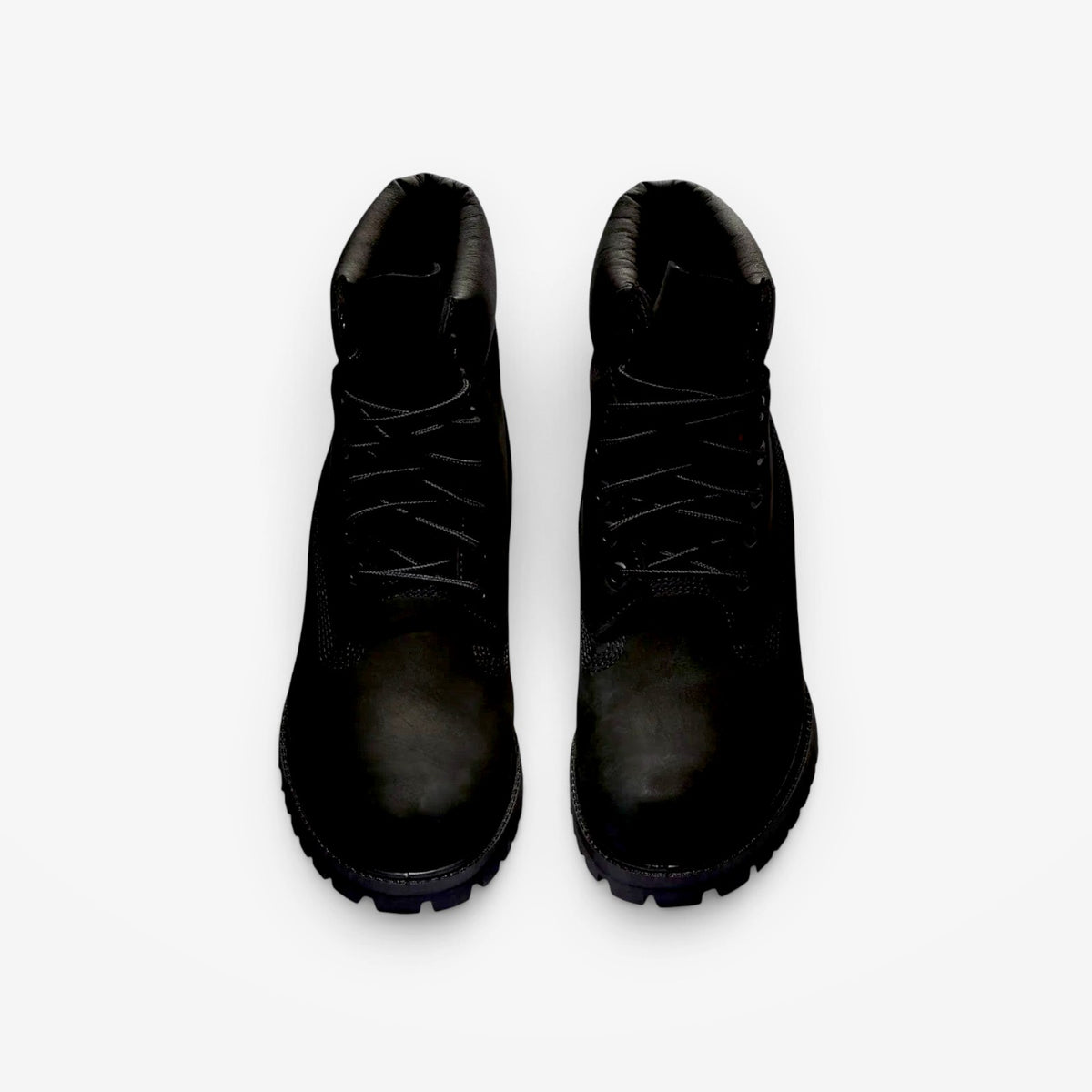 METRO Timberland 6-Inch Premium waterproof boots in black leather with a padded collar and rugged rubber lug outsole.