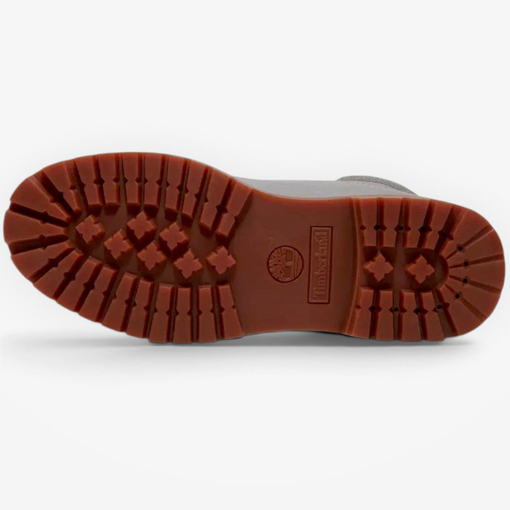 METRO Timberland Premium 6-Inch waterproof boot showing the durable brown rubber lug outsole with brand logo