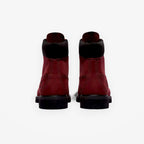 Rear view of METRO Timberland Premium 6-Inch waterproof boots in burgundy nubuck leather with black padded collars.