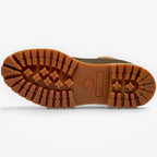 METRO Timberland dark brown waterproof boot showing the durable rubber lug outsole with traction pattern