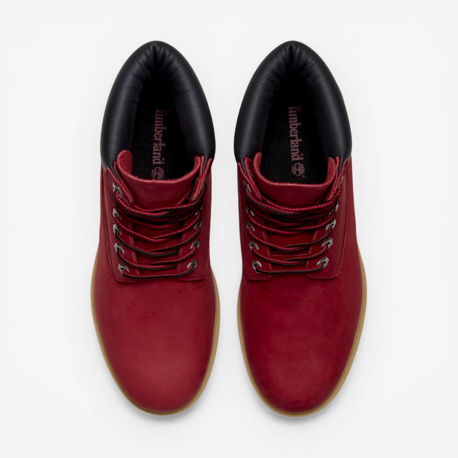 METRO Timberland 6-Inch Premium Waterproof Boots in dark red leather with black padded collar and red laces.