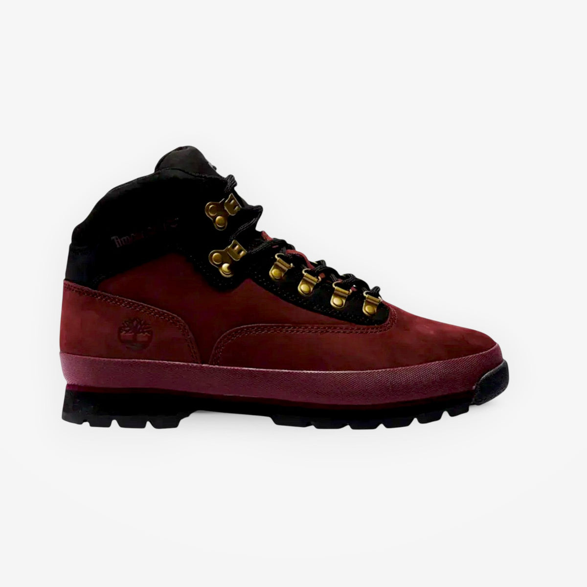 METRO Timberland Euro Hiker Mid boot in burgundy leather with a padded black collar and gold-tone metal lace hardware.