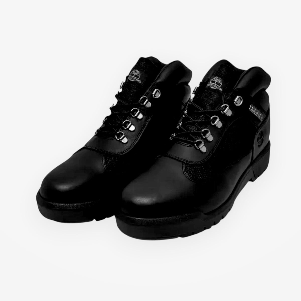 METRO Timberland Euro Hiker Mid black leather boots featuring a padded collar, metal eyelets, and durable rubber outsole.