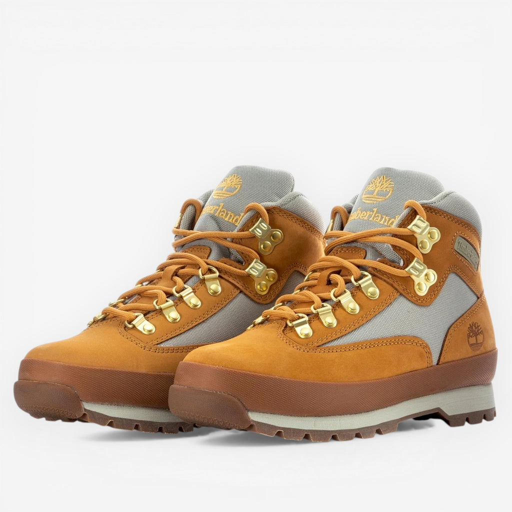 METRO Timberland Euro Hiker Mid wheat nubuck leather hiking boots with grey textile panels and gold eyelets.