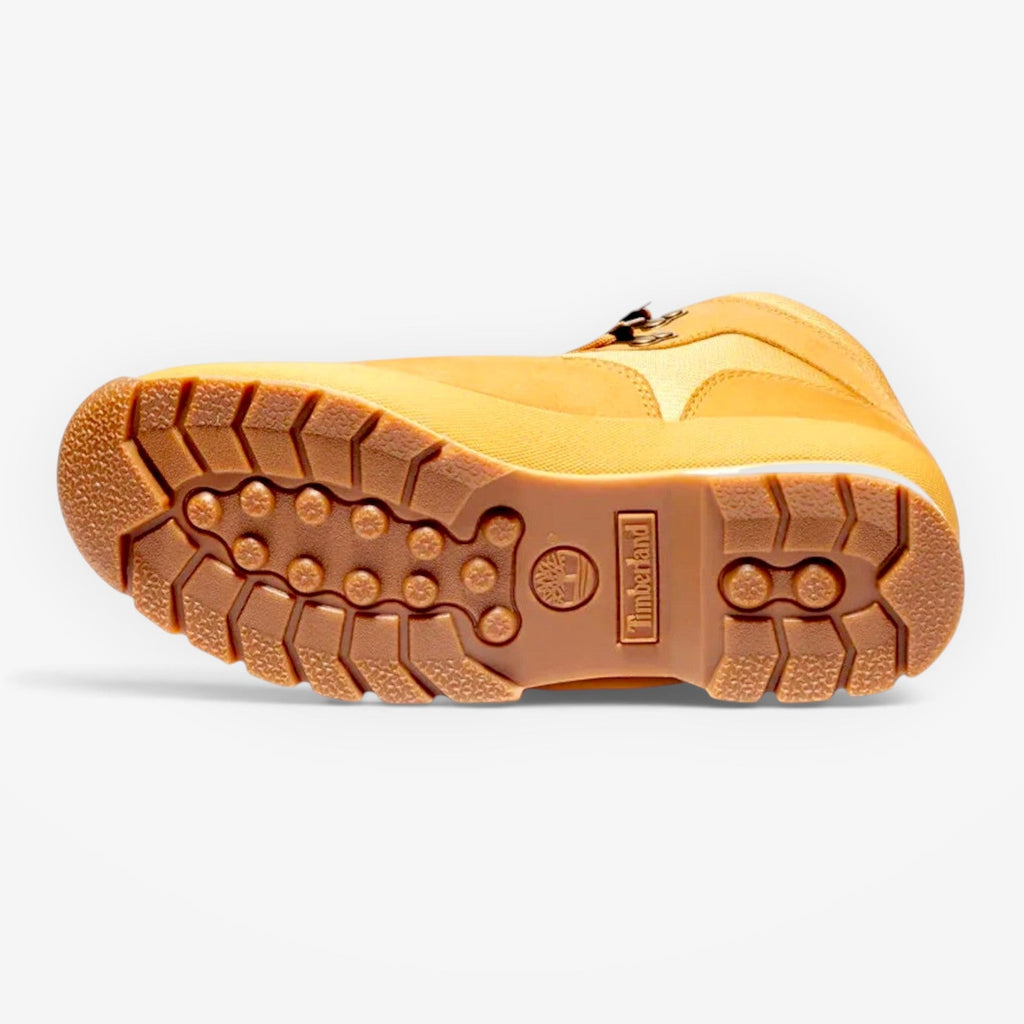 METRO Timberland Euro Hiker Mid boot in wheat nubuck, showing the durable rubber lug outsole and tread pattern.