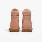 METRO Women’s Timberland Premium 6-Inch Boot in light pink nubuck leather, rear view showing lug soles.