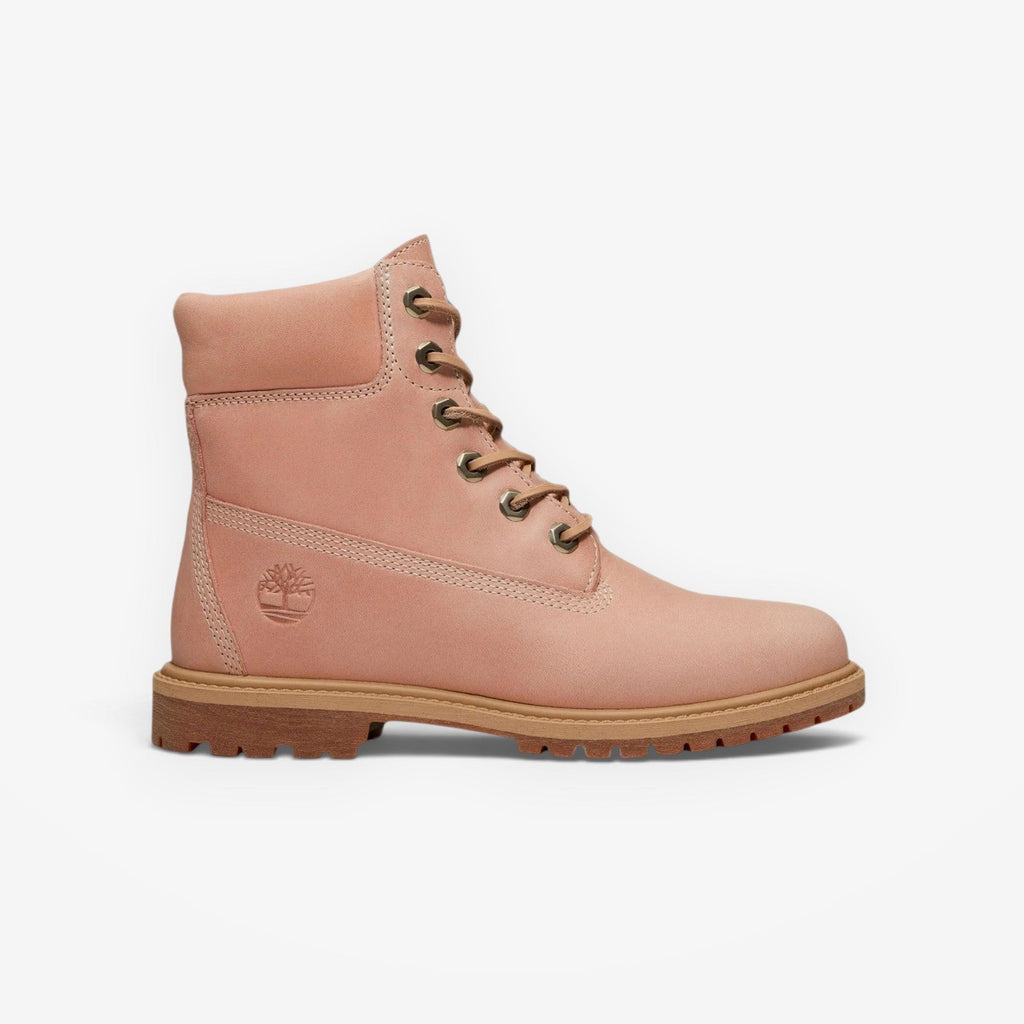 METRO Women’s Timberland Premium 6-Inch Boot in light pink nubuck leather with a rugged gum rubber sole.