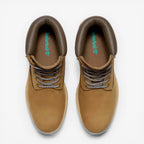 METRO Timberland Premium 6-Inch Waterproof Boot in olive nubuck and dark brown leather with padded collar and lug sole.