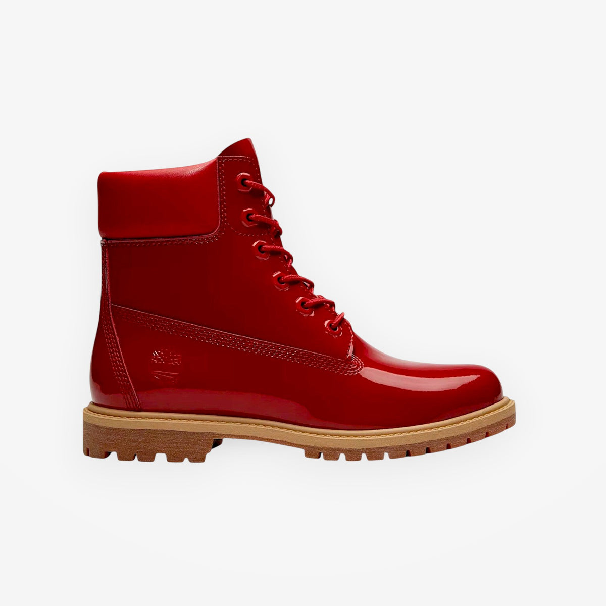 METRO Timberland women's 6-inch waterproof boot in glossy red patent leather with a durable rubber lug outsole.