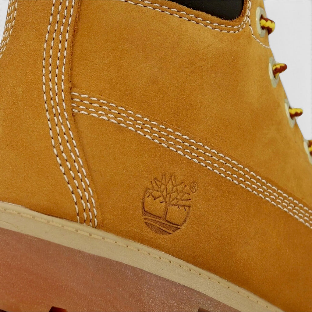 METRO Timberland Premium 6-Inch wheat nubuck leather boot with embossed logo and contrast stitching