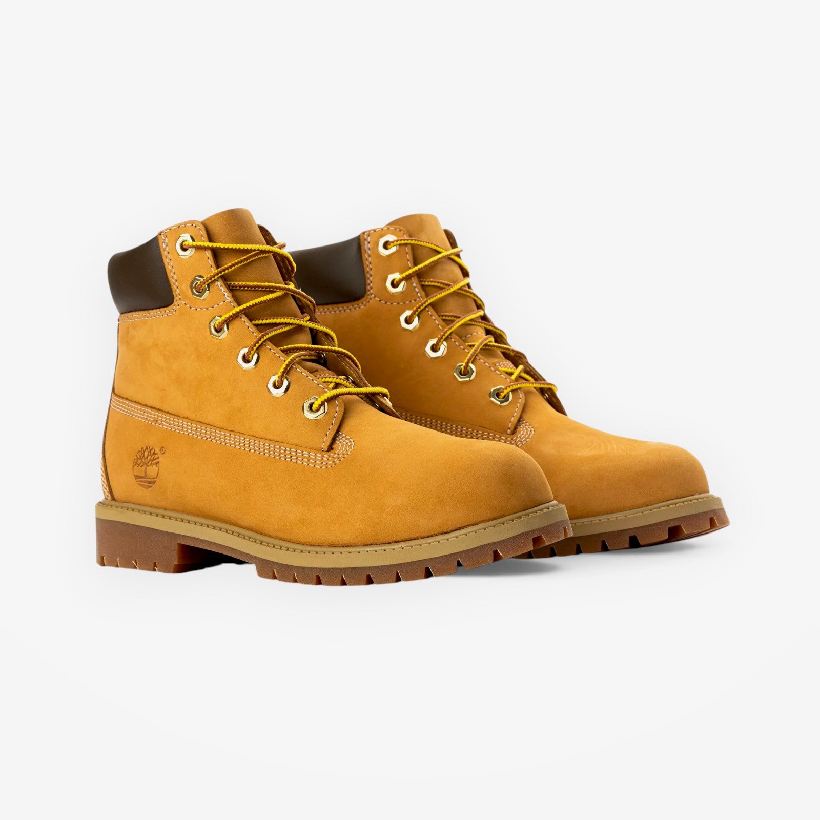 METRO Timberland 6 Inch wheat nubuck leather boots for grade school with yellow laces and brown padded collars