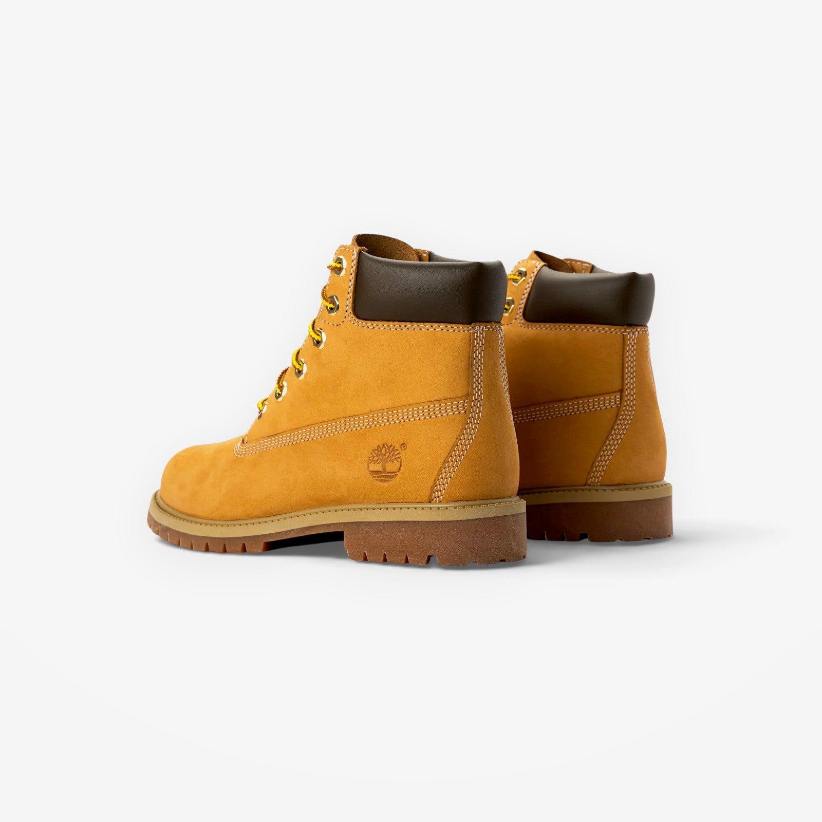 METRO Timberland 6 Inch wheat nubuck leather boots with dark brown padded collars and lug soles