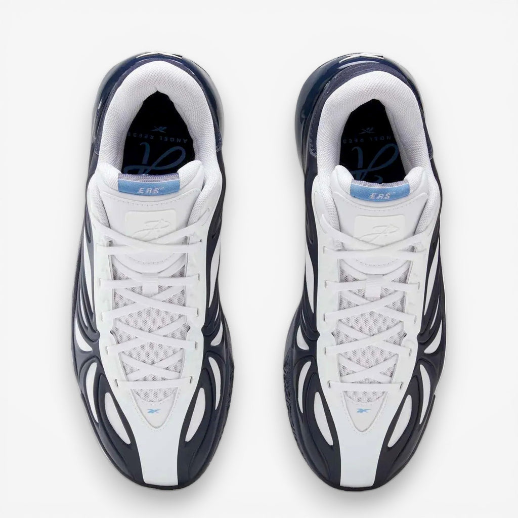 METRO Reebok Angel Reese 1 basketball shoes in navy, white, and peri blue with mesh upper and supportive overlays.